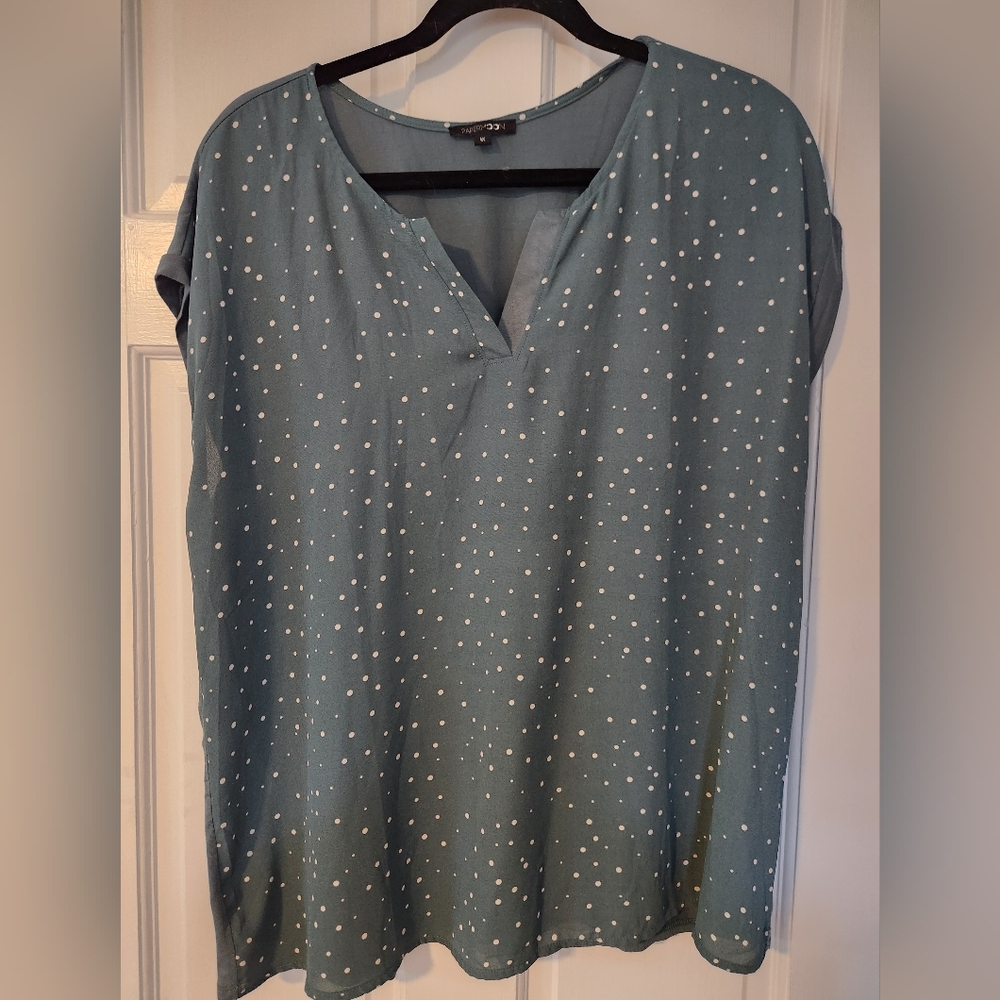 Green polka dot blouse